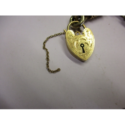 99 - A 9ct gold twisted rope bracelet, with padlock clasp, Approximate weight 52.8g.