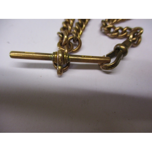 102 - A 9ct gold albert chain with a 9ct gold and bloodstone fob watch key. Approximate weight 42.5g.