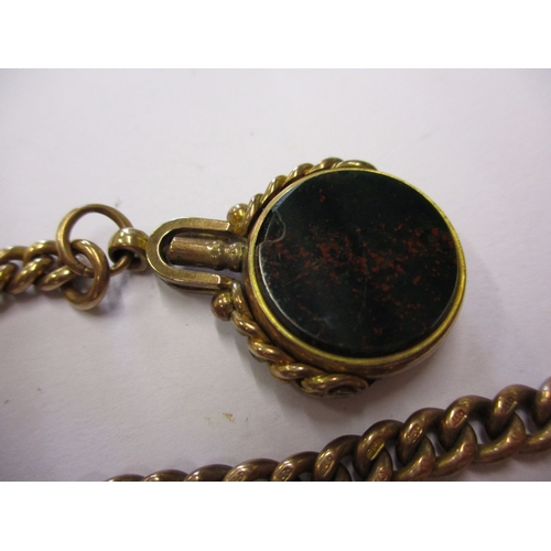 102 - A 9ct gold albert chain with a 9ct gold and bloodstone fob watch key. Approximate weight 42.5g.