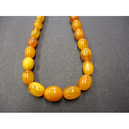 110 - A vintage butterscotch Baltic amber bead necklace, approx. weight, 26.g,