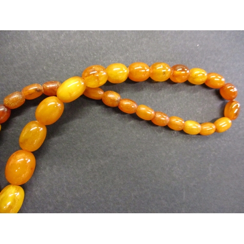 110 - A vintage butterscotch Baltic amber bead necklace, approx. weight, 26.g,