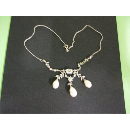 116 - A bespoke made silver, pearl and simulated diamond necklace