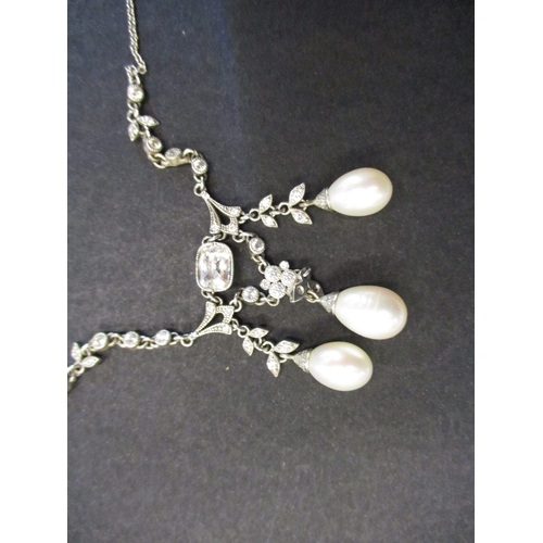 116 - A bespoke made silver, pearl and simulated diamond necklace