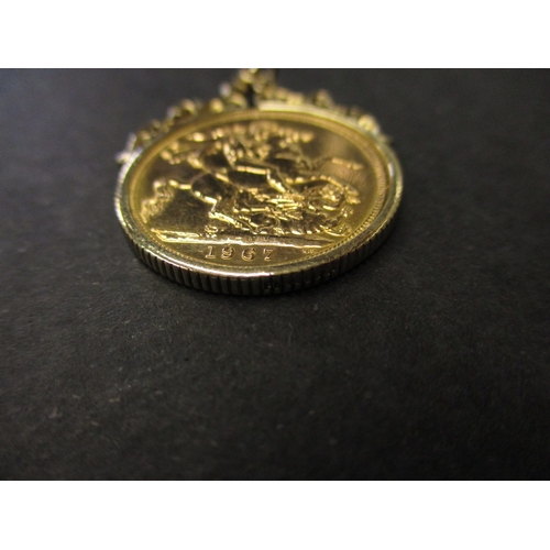 126 - A 1967 gold sovereign in a 9ct pendant mount