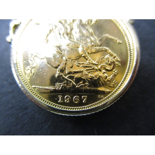 126 - A 1967 gold sovereign in a 9ct pendant mount