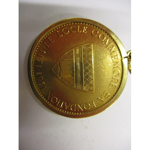 132 - A 1951 Swiss Le Locle Foundation 18ct gold token/medallion, in an 18ct gold mount, approx. total wei... 