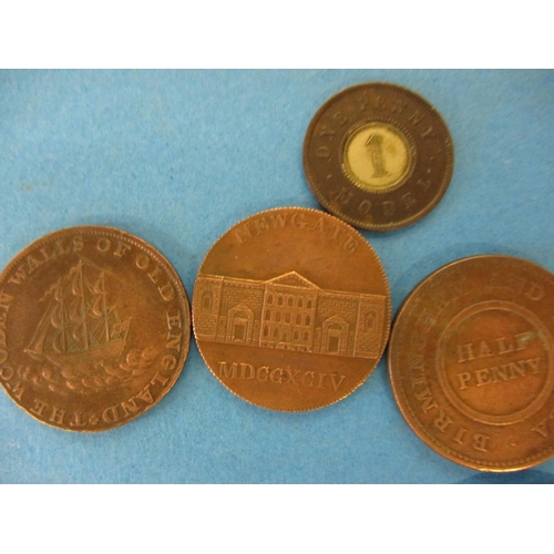 144 - A quantity of 19th century trade tokens to include a British Copper Company 1 penny