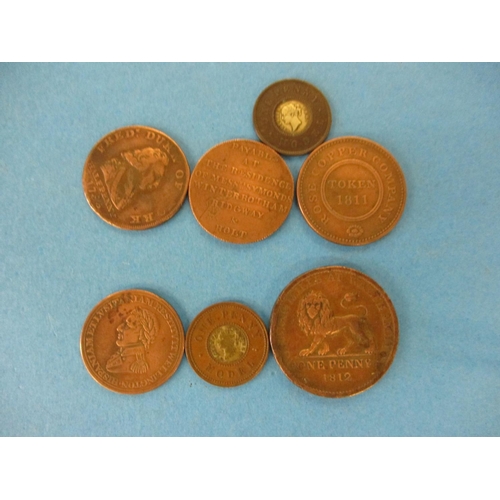 144 - A quantity of 19th century trade tokens to include a British Copper Company 1 penny