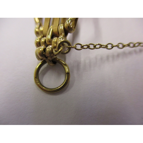 155 - A 9ct yellow gold bracelet with working heart clasp and safety chain, approx. weight 20g