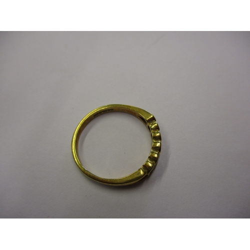 159 - An 18ct yellow gold eternity ring set with 5 diamonds, approx. ring size Q