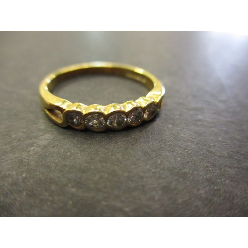 159 - An 18ct yellow gold eternity ring set with 5 diamonds, approx. ring size Q