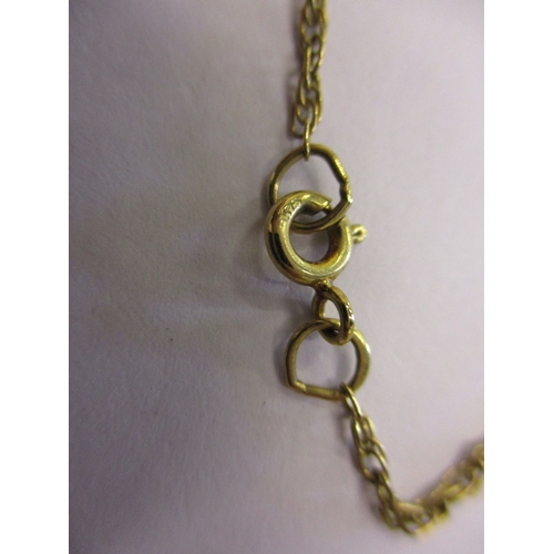 161 - A 9ct gold necklace and pendant, approx. weight 5g