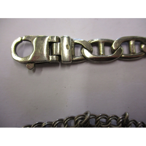 167 - A quantity of vintage silver jewellery to include charm bracelets, approximate weight 140g