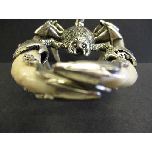 168 - A white metal and animal tooth scorpion sculpture