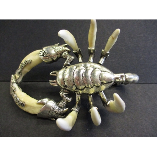 168 - A white metal and animal tooth scorpion sculpture