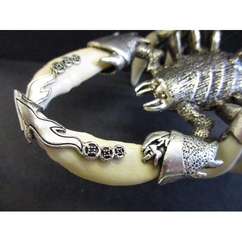 168 - A white metal and animal tooth scorpion sculpture