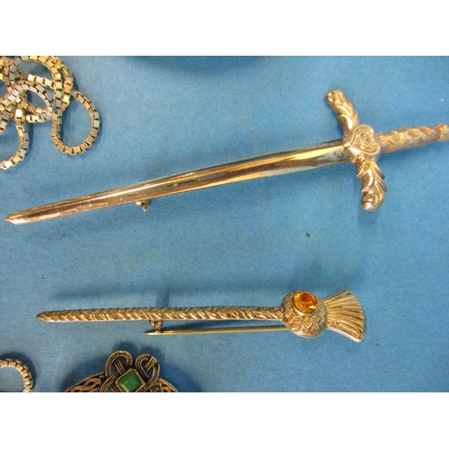 172 - A parcel of sterling silver items, to include Scottish kilt pins and a brooch