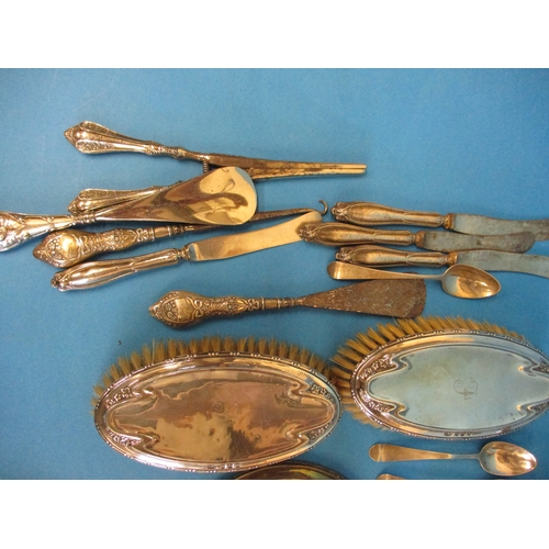 173 - A very large quantity of silver items, to include dressing table sets and bud vases