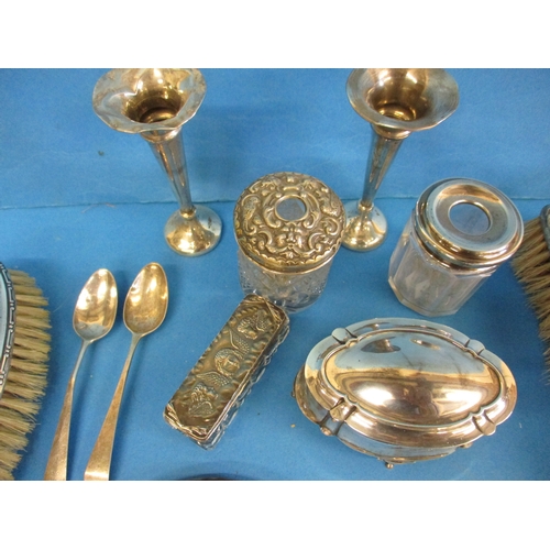 173 - A very large quantity of silver items, to include dressing table sets and bud vases