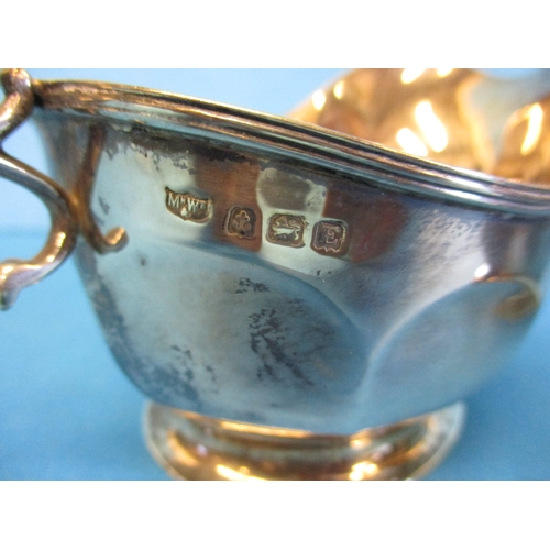 177 - A pair of early 20th century sterling silver sauce boats, approx. weight 255g