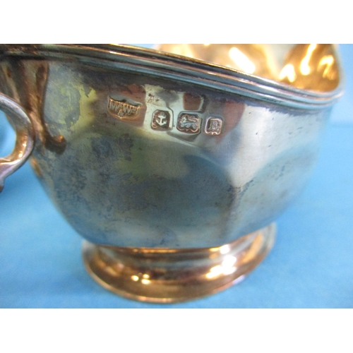 177 - A pair of early 20th century sterling silver sauce boats, approx. weight 255g