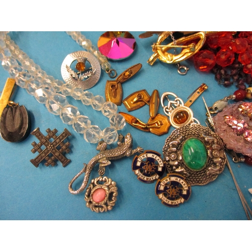 185 - A large quantity of vintage costume jewellery, to include some silver items