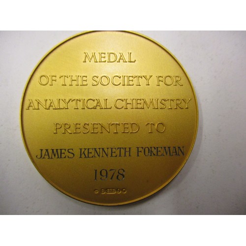 102 - A 9ct gold medal of the society for analytical chemistry, approx. weight 64.7g approx. diameter 51mm... 