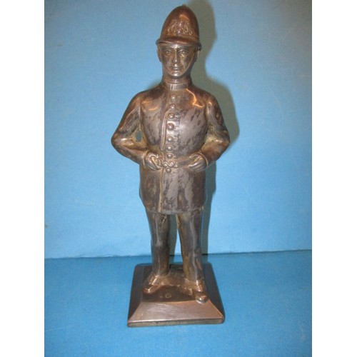 154 - A spelter lighter in the form a London policeman