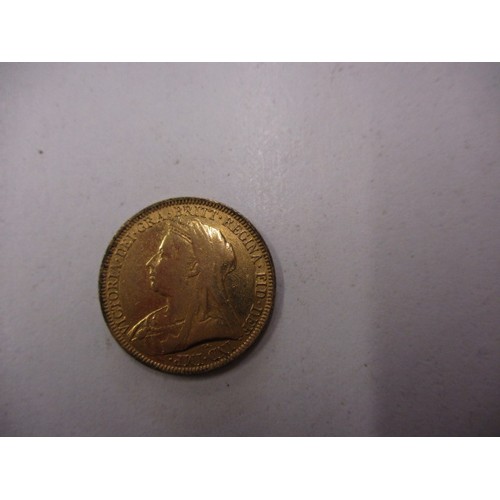 103 - An Victorian gold full sovereign dated 1893, with a loose 9ct gold mount,