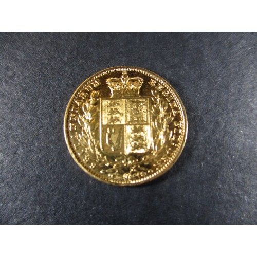 106 - An 1854 shield back gold sovereign