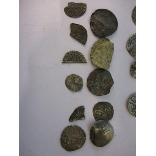 112 - A quantity of medieval hammered silver coins, to include clipped examples