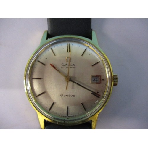 99 - A vintage Omega Automatic wrist watch with leather strap and yellow metal case. Dial diameter approx... 