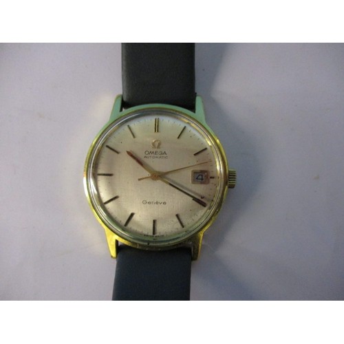 99 - A vintage Omega Automatic wrist watch with leather strap and yellow metal case. Dial diameter approx... 