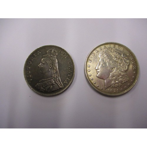 113 - A 1921 American silver Dollar and an 1887 Queen Victoria crown, approx. weight of dollar 26.7g appro... 