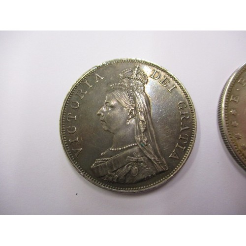 113 - A 1921 American silver Dollar and an 1887 Queen Victoria crown, approx. weight of dollar 26.7g appro... 