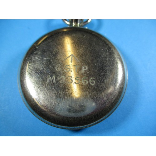 97 - A Morris WWII military pocket watch with black dial and case marked G.S.T.P M23566