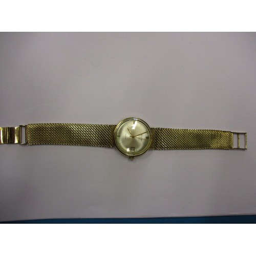 91 - A gold cased Record Automatic wristwatch, having a 9ct gold mesh strap and date dial. Dial diameter ... 