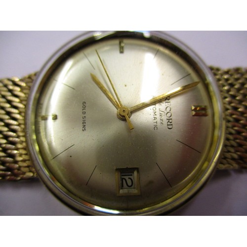 91 - A gold cased Record Automatic wristwatch, having a 9ct gold mesh strap and date dial. Dial diameter ... 