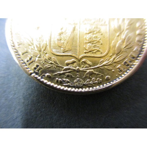 109 - A Victorian young head shield back sovereign dated 1863, in pre-owned condition with general age-rel... 