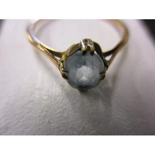 25 - An antique 9ct gold ring set with a pale blue stone, approx. weight 1.5g approx. ring size P, in pre... 