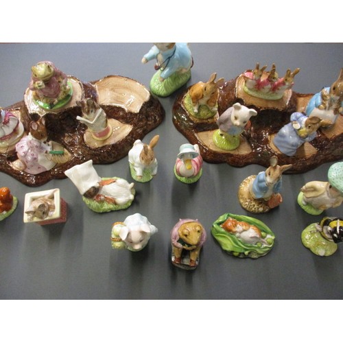 216 - A collection of vintage Beatrix Potter figures, all in un-damaged condition, also include 2 Beswick ... 