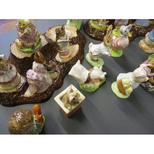 216 - A collection of vintage Beatrix Potter figures, all in un-damaged condition, also include 2 Beswick ... 