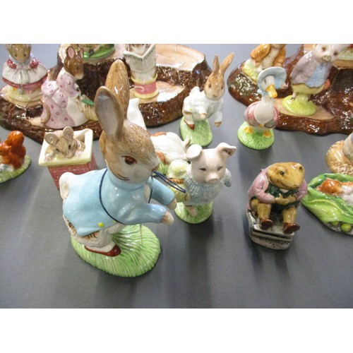 216 - A collection of vintage Beatrix Potter figures, all in un-damaged condition, also include 2 Beswick ... 