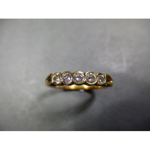 3 - An 18ct yellow gold eternity ring set with 5 diamonds, approx. ring size ‘Q’ in good clean pre-owned... 