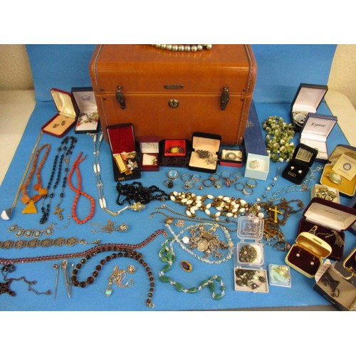 62 - A very large quantity of vintage jewellery to include gold and silver items, with Samsonite jeweller... 