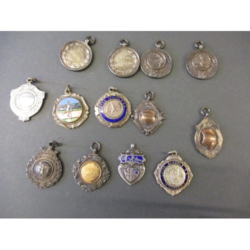 70 - A parcel of 1930s and later silver medallions, some for Luton School also includes some white metal ... 