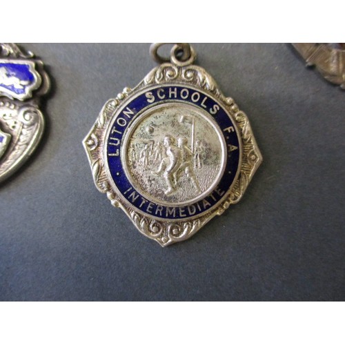 70 - A parcel of 1930s and later silver medallions, some for Luton School also includes some white metal ... 