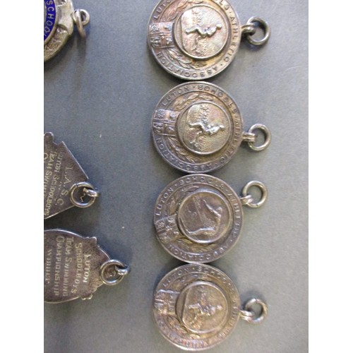 70 - A parcel of 1930s and later silver medallions, some for Luton School also includes some white metal ... 