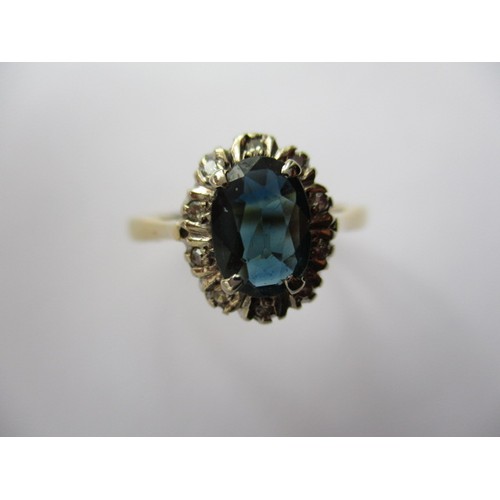 295 - An 18ct yellow gold sapphire ring, in pre-owned condition with use related marks, approx. ring size ... 