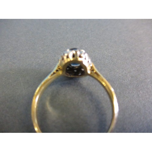 295 - An 18ct yellow gold sapphire ring, in pre-owned condition with use related marks, approx. ring size ... 